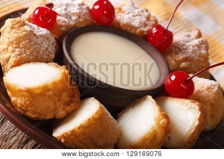Leche Frita With Condensed Milk And Cherries Macro. Horizontal