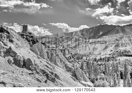 Ruins and Basgo Monastery surrounded with stones and rocks Leh Ladakh Jammu and Kashmir India black and white image