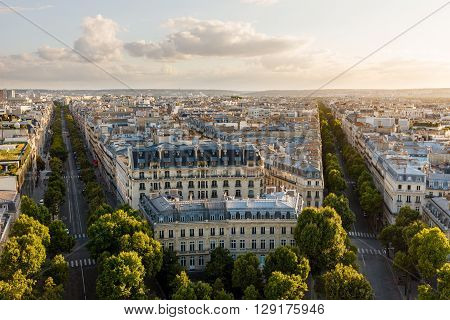 Late summer afternoon 16th arrondissement rooftops in Paris France. Aerial view of Haussmannian style buildings rooftops, between Avenue Kleber and Avenue Victor Hugo.