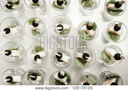 Catering buffet table with a delicious food on white background