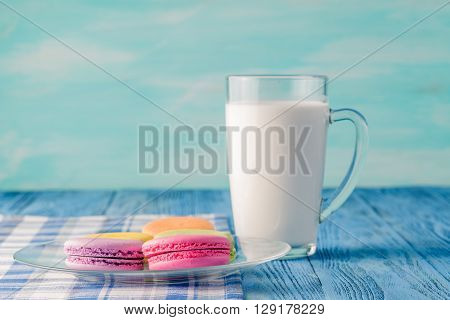 Colorful Macaroons And Glss Of Milk