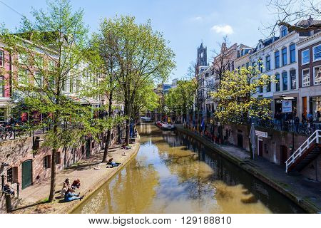 Utrecht Netherlands - April 20 2016: old town scene at a canal in Utrecht. The university city Utrecht is the 4th largest city of the Netherlands and capital of the same named province