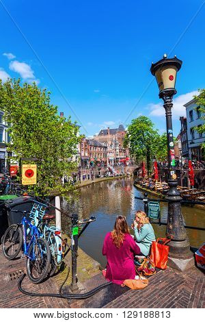 Utrecht Netherlands - April 20 2016: old town scene at a canal in Utrecht. The university city Utrecht is the 4th largest city of the Netherlands and capital of the same named province