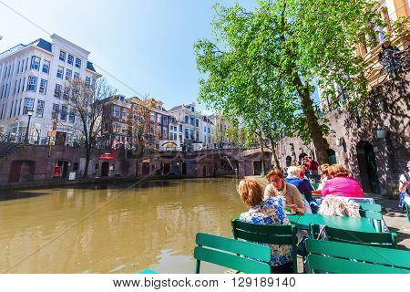 Utrecht Netherlands - April 20 2016: old town scene at a canal in Utrecht. The university city Utrecht is the 4th largest city of the Netherlands and capital of the same named province