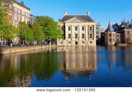 The Hague Netherlands - April 20 2016: Mauritshuis in The Hague with unidentified people. It is an art museum that houses the Royal Cabinet of Paintings with mostly Dutch Golden Age paintings