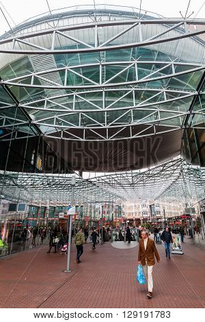 Zoetermeer Netherlands - April 22 2016: shopping center Spazio with unidentified people. From villages with 10000 inhabitants Zoetermeer grew up after 1962 to a city with 100.000 inhabitants 1991