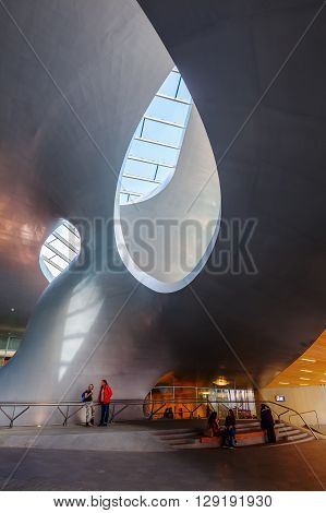 Arnhem Netherlands - April 19 2016: Arnhem Centraal railw station with unidentified people. After reconstruction it was reopened 2015. The new design was by UNStudio that won an architecture price