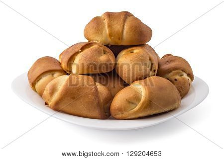 Fresh bavarian pastries rolls, kifla kiflice, on white plate, isolated on white background