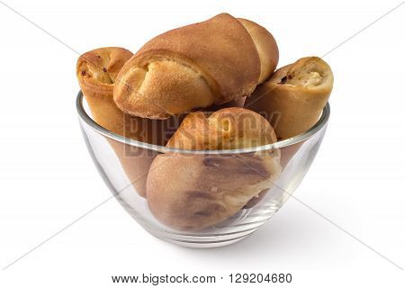 Fresh bavarian pastries rolls, kifla kiflice, in the glass bowl, isolated on white background
