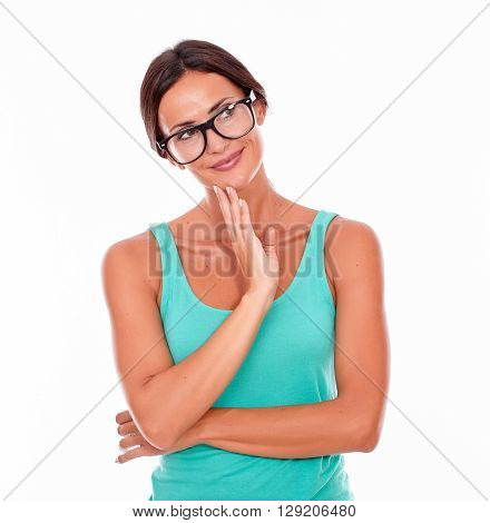 Contemplating Brunette Woman With Green Tank Top