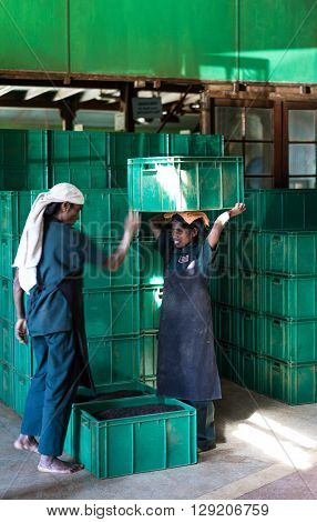 Ramboda Valley Sri Lanka - December 10 2012: Local workers in an old English tea factory