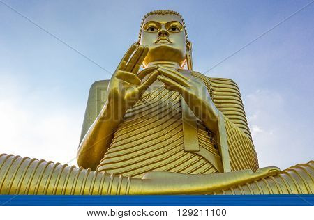 Sri Lanka Danbulla detail of the large Buddah statue at the entrance of the Golden Temple