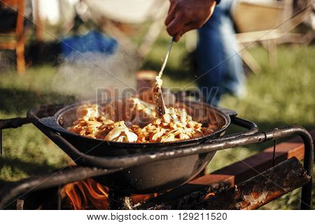 country family weekend picnic bbq with hot meat