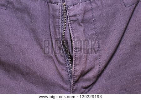 open fly purple jeans texture background closeup