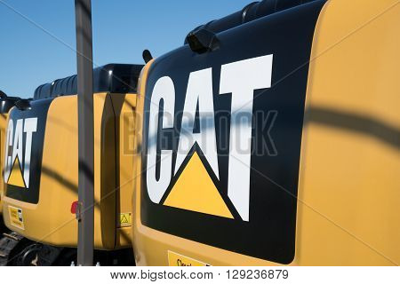 Litiz, PA USA - April 23, 2016: Caterpillar heavy equipment lined up at Caterpillar dealer. Caterpillar is one of the largest manufacturers of heavy construction & mining equipment in the world.