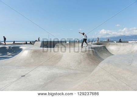Venice Beach USA October 6 2015; youth action at Skate Park riding their boards at Venice Beach