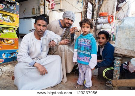 DARAW, EGYPT - FEBRUARY 6, 2016: Local family posing for camera at Daraw market.