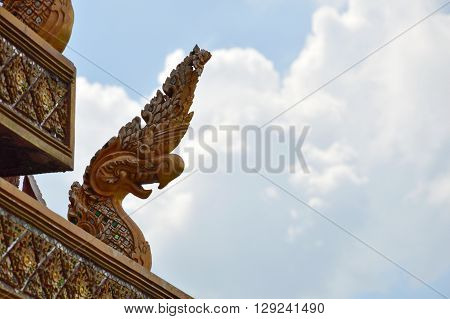 Naka king of snake statue on temple roof