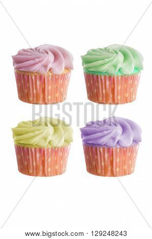 Colorful cupcake with thick frosting or icing isolated ona white background