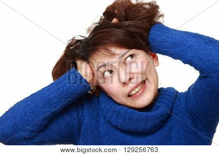 portrait of demented woman on white background