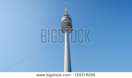 Munich, Germany, 24 April 2016: in Park, Munich Germany. The Tower (German: Olympiaturm) in the Park, Munich was built for the 1972 Summer Olympics.