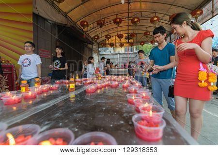 Bangkok Thailand - March 6 2016 : Thai people pray in temple at Wat Mangkon Kamalawat (Wat Leng Noei Yi). Wat Leng Noei Yi is the most important Chinese Buddhist temple in Bangkok Thailand.