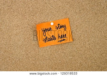 Your Story Starts Here Written On Orange Paper Note