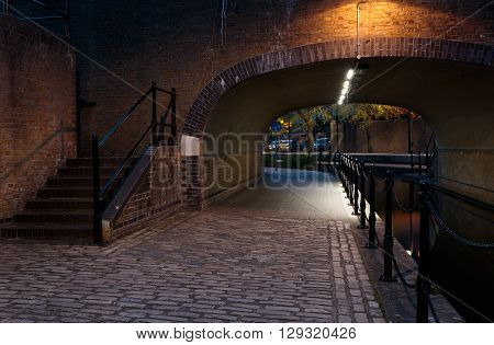 Albion Channel under a path bridge an ornamental canal created linking Canada Water to Surrey Water