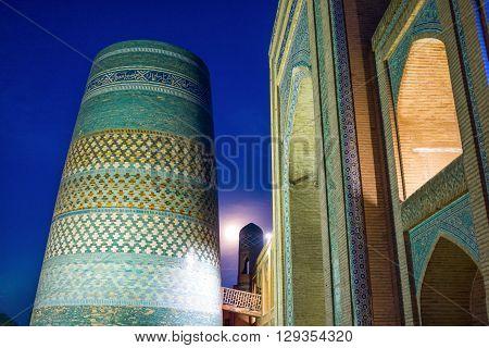 Uzbekistan Khiva night view of the Kalta Minor minaret at Muhammad Amin Khan Madrassah