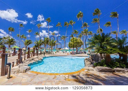 Beach tourist resort swimming pool. Aruba travel