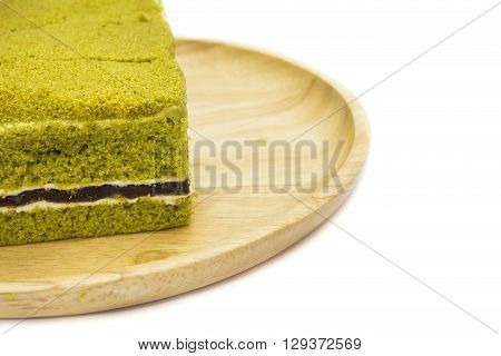 Closeup Japanese Matcha green tea cake cheesecake. space background