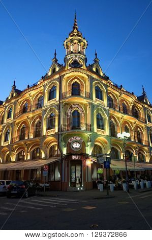 ORADEA, ROMANIA - AUGUST 01, 2015:  Grand hotel Astoria by Night was realized by Sztarill Ferenc in 1902 in Jugendstil with gothic impressions