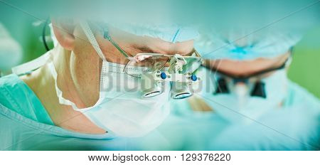 male cardiac surgeon at child cardiosurgery operating room
