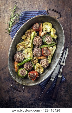 Rice Meatballs with Vegetable in Copper Pod