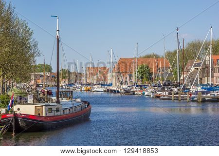 ENKHUIZEN, NETHERLANDS - MAY 9, 2016: Harbor in the enter of historical village Enkhuizen, Netherlands