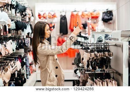 Beautiful young woman shopping lingerie and underware