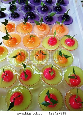 Thai Sweet Bean Confections plating in Coconut Sweet Pudding Jelly (Thai Dessert of Kanom Look Choup nai Wun Kati)