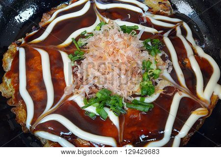 Japanese Okonomiyaki is japanese pizza great and yammy
