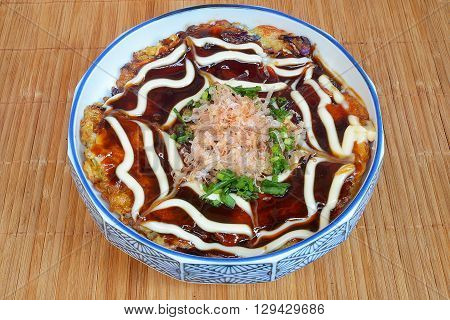 Japanese Okonomiyaki is japanese pizza great and yammy