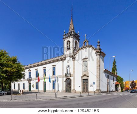 Vila Nova de Famalicao, Portugal. September 06, 2015: Panorama of the Lapa Chapel - a Sacred Art Museum (right), and the Lusiada University branch (left) in Vila Nova de Famalicao, Portugal.