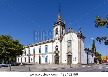 Vila Nova de Famalicao, Portugal. September 06, 2015: Lapa Chapel - a Sacred Art Museum (right), and the Lusiada University branch (left) in Vila Nova de Famalicao, Portugal.