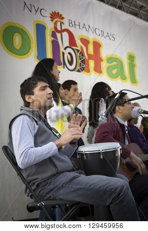 NEW YORK - APR 30 2016: Musicians perform on stage at the Holi Day Festival of Colors in Dag Hammerskjold Plaza hosted by NYC Bhangra in New York on April 30, 2016.