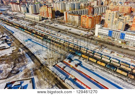 Tyumen, Russia - March 9, 2016: The railroad along 50 let VLKSM Street, dividing old and new districts of the city