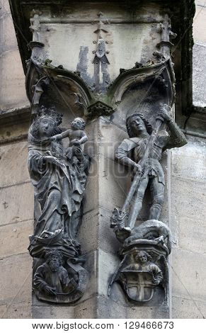 TUBINGEN, GERMANY - OCTOBER 21: Virgin Mary with baby Jesus and Saint George, Collegiate Church of St. George in Tubingen, Germany on October 21, 2014.