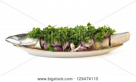 salt mackerel with herbs on a white background