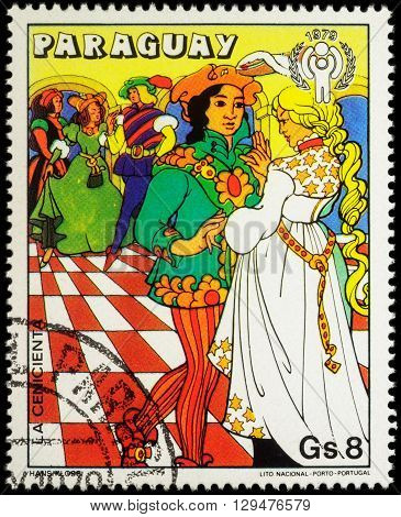 MOSCOW RUSSIA - MAY 11 2016: A stamp printed in Paraguay shows Cinderella and Prince - scene from a fairy tale series 
