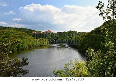Beautiful Gothic castle Veveri. The city of Brno at the Brno dam. South Moravia - Czech Republic - Central Europe.