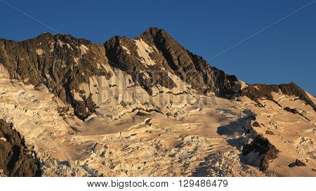 Glacier and high mountain and near Mt Cook. Mt Sefton New Zealand.