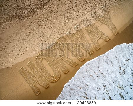 Norway written on the beach