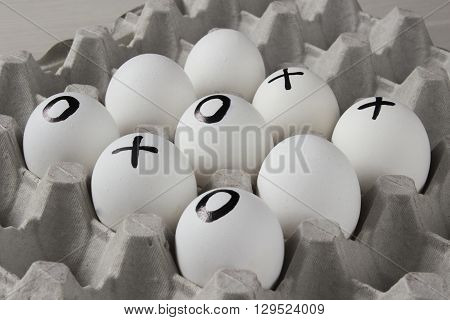 win or lose. Drawing on eggs - tic-tac-toe game
